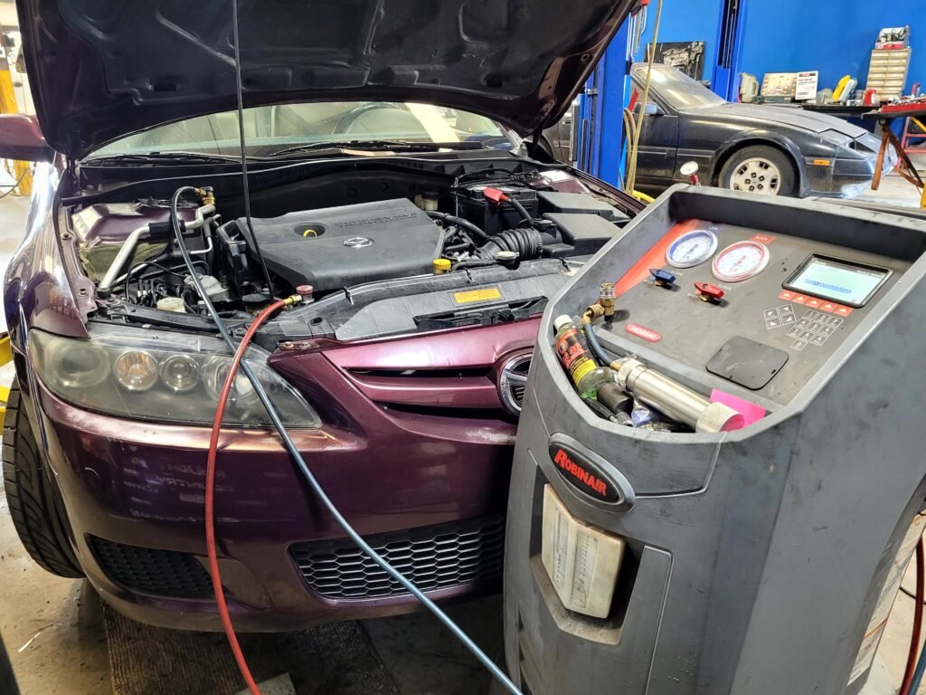 Car Getting A/C Service
